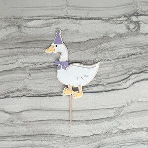 Goose cupcake topper shown in light purple accent color.
