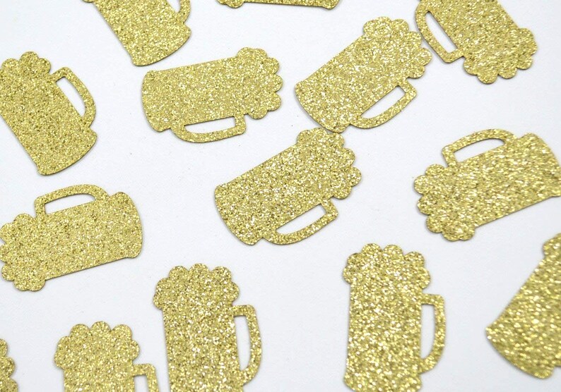 Beer mug shaped confetti pieces in gold glitter.