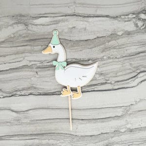 Goose cupcake topper shown in mint green accent color.