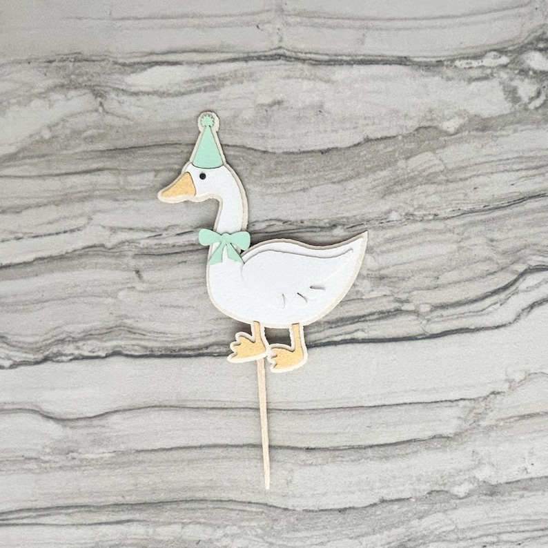 Goose cupcake topper shown in mint green accent color.