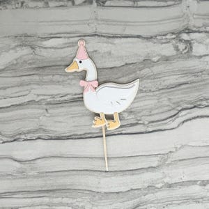 Goose cupcake topper shown in light pink accent color.