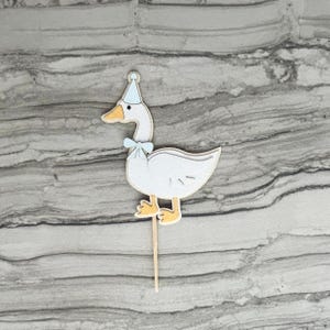 Goose cupcake topper shown in light blue accent color.