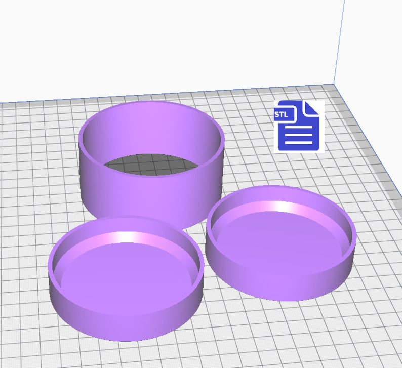 May include: Three purple 3D printed cylindrical shapes, two of which are lids for the taller cylinder. The image includes the text "STL" in a blue document icon.