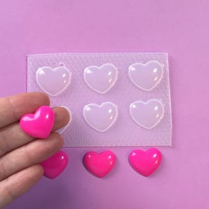 Molde de plástico pequeño con forma de corazón de burbuja