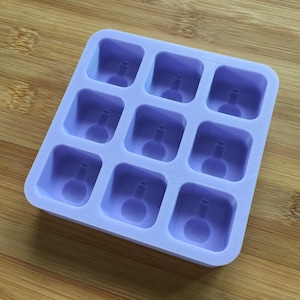 May include: A lavender silicone mould with nine square cavities, each featuring a raised design of a small bottle. The mould is designed for making small, bottle-shaped soaps, candles, or other crafts.