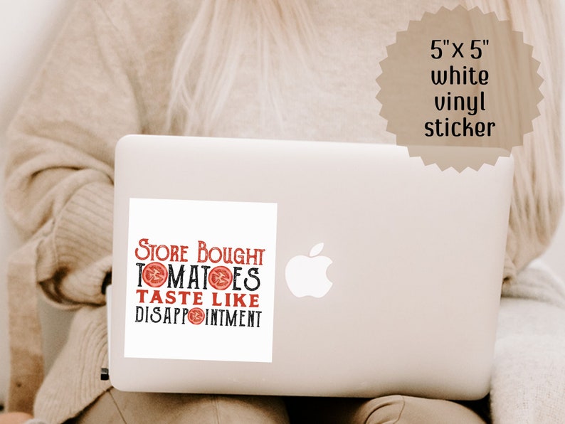 May include: A white vinyl sticker with the text "Store Bought Tomatoes Taste Like Disappointment" in black text with red tomato illustrations. The sticker is 5 inches by 5 inches and is on a laptop.