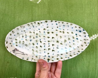 Bunny in meadow, oval dish