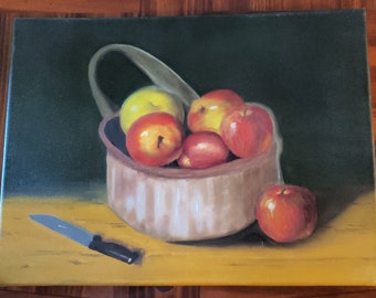 May include: A still life painting of a wooden bowl filled with red and yellow apples. A silver knife is on the table next to the bowl.