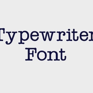 May include: Typewriter Font text in a dark blue colour against a light grey background.