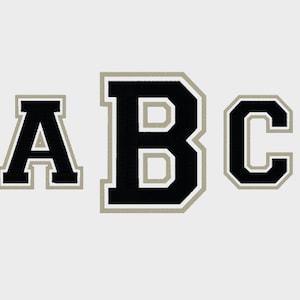 May include: Black and white letters A, B, and C in a varsity style font with a gray outline.