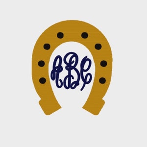 May include: A gold horseshoe with black dots around the edge and a navy blue monogram "ABC" in the center.