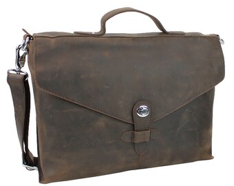 May include: A brown leather briefcase with a flap closure and a silver buckle. The bag has a shoulder strap and a top handle.