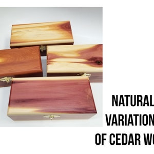 May include: Four wooden boxes made of cedar wood, showcasing the natural variations in color and grain patterns. The boxes are arranged in a staggered formation, with the top box being the lightest in color and the bottom box being the darkest.