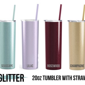 May include: Four glitter 20oz tumblers with straws in various colors: Seascape, Lilac, Rosewood, and Champagne. Each tumbler has a matching colored straw. The word "Glitter" and "20oz Tumbler with Straw" are printed below the tumblers.