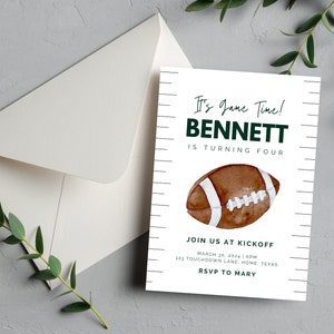May include: A white invitation with green and black text that reads "It's Game Time! Bennett is turning four. Join us at kickoff March 30, 2024 | 6PM 123 Touchdown Lane, Home, Texas RSVP to Mary". A brown and white football is illustrated on the invitation.