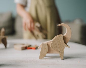 Wooden elephant puzzle gift with pink magnets