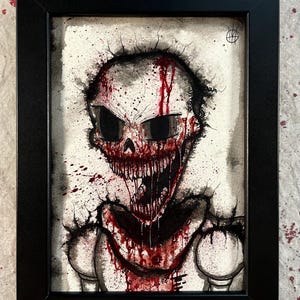 Puede incluir: Una pintura de acuarela en blanco y negro de una calavera con la boca ensangrentada y sangre goteando. La calavera está sobre un fondo blanco con manchas negras.
