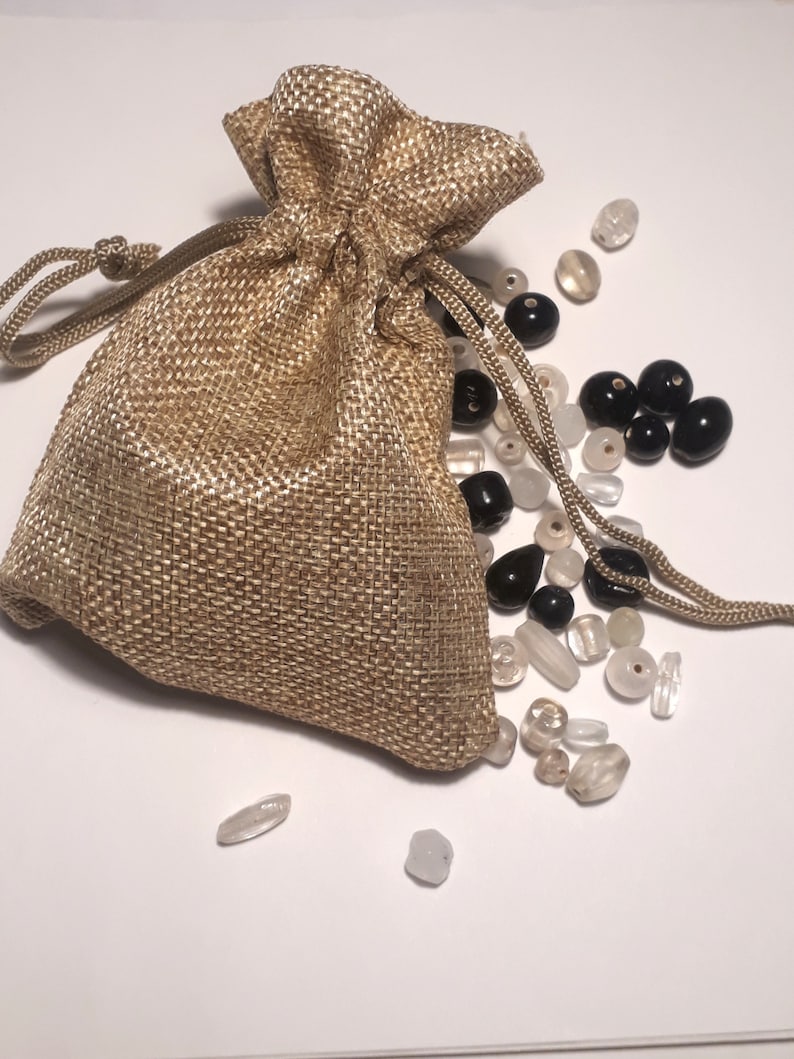 sizes designs hand made in India fairtrade in hesian gift bag ready gift A bagful of beads black and white glass beads mixed shapes