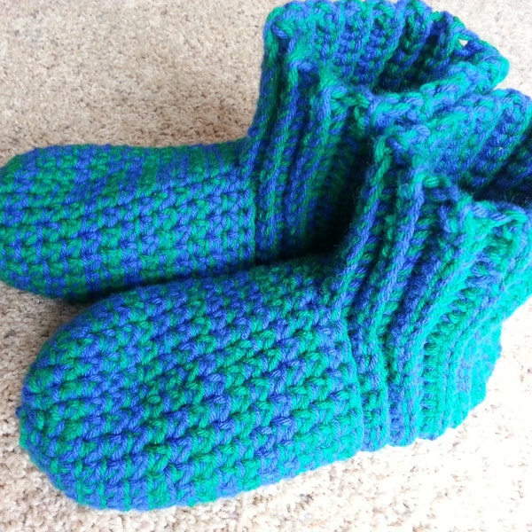 Slipper socks double thickness made to fit  the whole family.  They are double thickness for extra warmth.