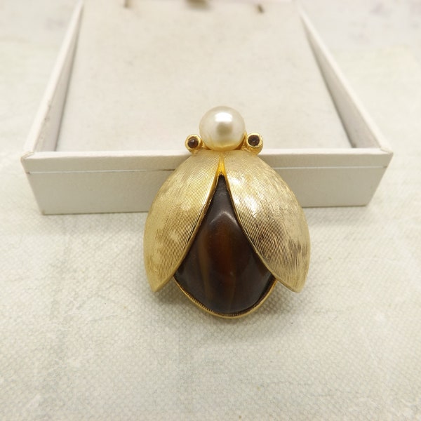 A real fun Sphinx little ladybird insect vintage jewelry brooch made in goldtone metal and set with a pearl and shiny brown stone