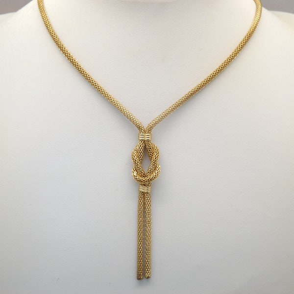 A very fine classic woven strand vintage costume jewelry necklace up two of woven strands of goldtone chain with center drops