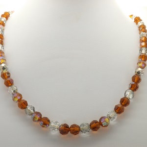 A beautiful silver and honey colour swarovski style vintage jewelry necklace handmade with sparkly clear silver finished faceted beads
