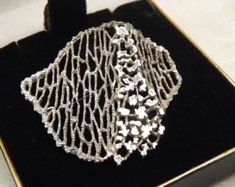 A beautiful abstract leaf brooch by Kords and Lichtenfels Germany made in an openwork raised design in patinated solid silver