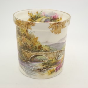 A superb quite rare vintage Shelley fine bone china open topped pot decorated with a hand painted scene of the Scottish highlands