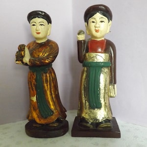 A very fine pair of Chinese antique hand carved standing figures made in wood and decorated in mixed colours paints. Height 9inches, 23 cms