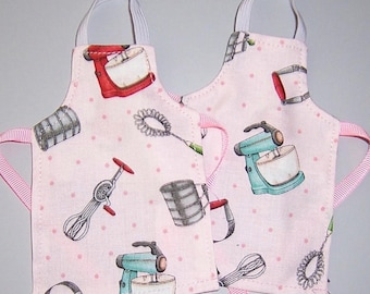 Set of 2 "Baking Utensils on Pink" Aprons-fits 11"-12" dolls
