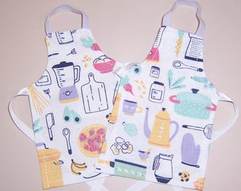 Set of 2 "Baking Ingredients" Aprons-fits 11"-12" dolls