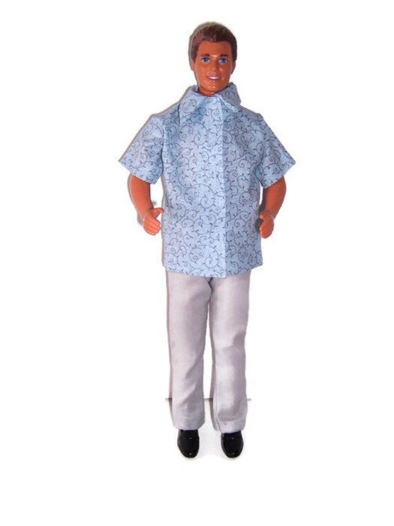 light blue shirt gray pants