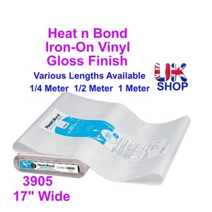 May include: A roll of white Heat n Bond Iron-On Vinyl with a gloss finish. The roll is 17 inches wide and is available in various lengths, including 1/4 metre, 1/2 metre, and 1 metre. The label on the roll says "Heat n Bond Iron-On Vinyl".
