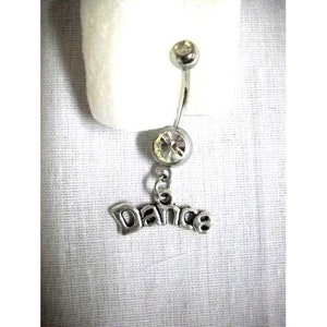 May include: Silver belly button ring with a clear crystal and a dangling charm that says "Dance".