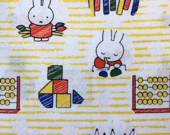 CRAFT//PATCHWORK FABRIC 100/% COTTON MIFFY RANGE COLOURED PENCILS AND ALPHABET