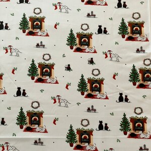 Dalmatian Dog Christmas fabric , features dogs and cats lying by a Christmas fireplace. Far away view.