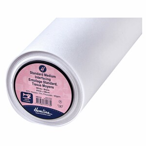 May include: A white roll of Standard Medium Interfacing fabric. The label reads "Standard Medium Interfacing, Entoilage Standard, Tissus Moyens, White/Blanc, 25mtr x 90cm, 30% Viscose 70% Polyester/80gsm, HN112".