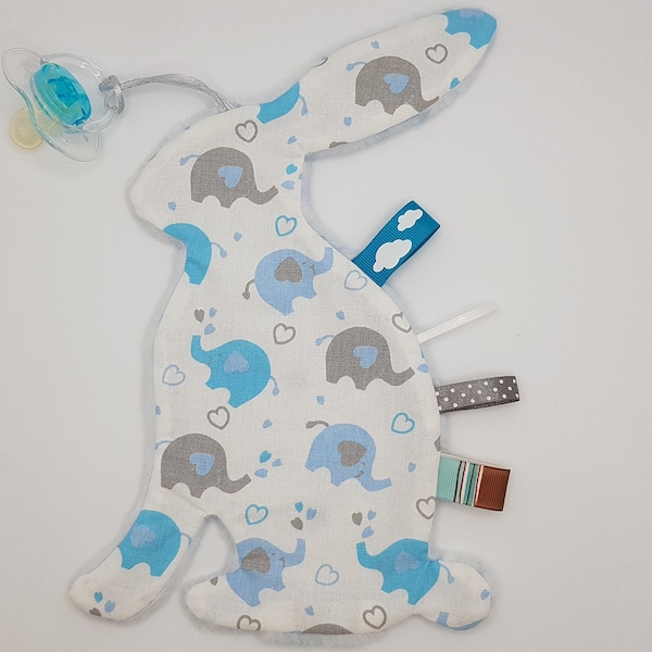 Doudou Plat Lapin Oeko-Tex tout doux éveil sensoriel avec ruban + Attache pour tétine