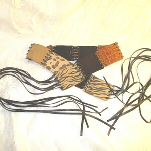 fringed leather patch belt