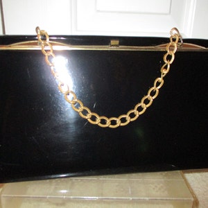 Cartera vintage de charol negro Theodor of California