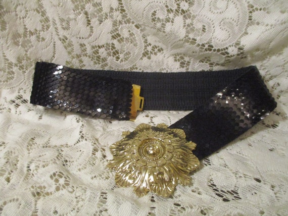 wide  stretch belt with large medallion buckle - image 1