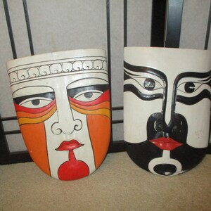 Hand painted carved wood tribal? masks pair