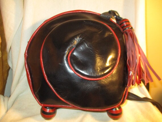 Carol Hearty Limited Edition Escargot leather cros