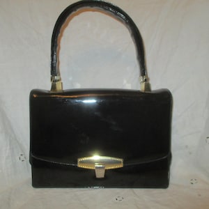 Koret Korettalak cartera/bolso de hombro de charol sintético