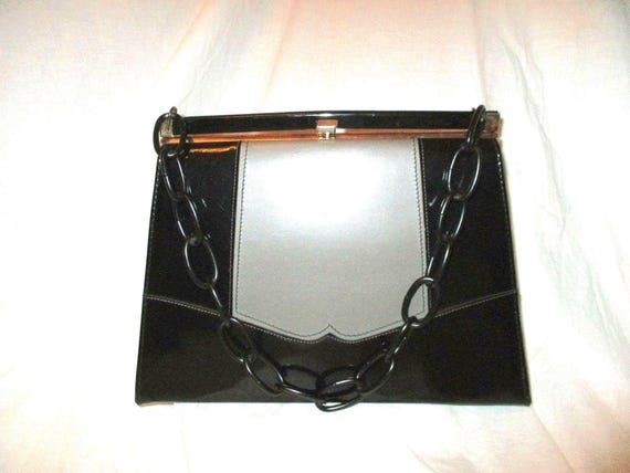 Risque faux patent leather satchel