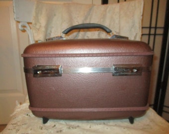 American Tourister bronze train case