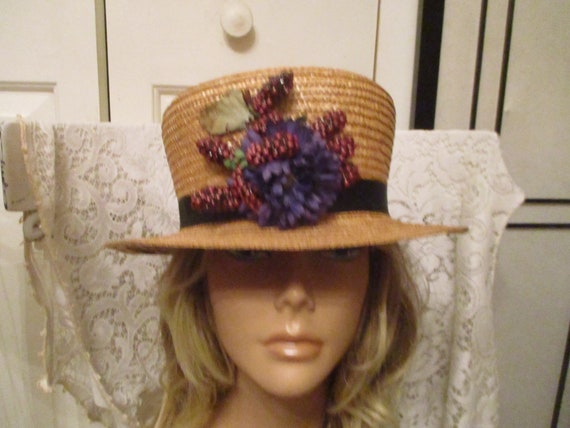 Straw boater hat with berries and purple flower - image 3