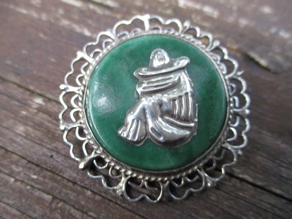 Mexican silver siesta pin with green stone - image 1
