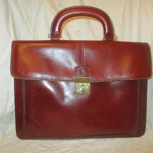 Sac attaché/porte-documents en cuir bordeaux vintage