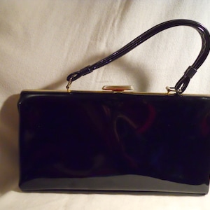 cartera de vinilo vintage Kismet Creations